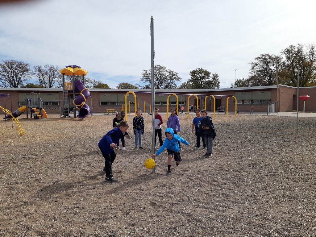 2nd Graders Will Picket & Dax Miller battling it out in a game of Tetherball.