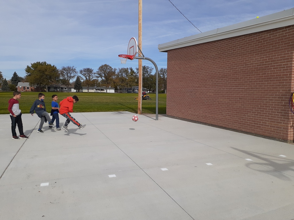 2nd Graders enjoying a game of Soccer style Wall Ball.