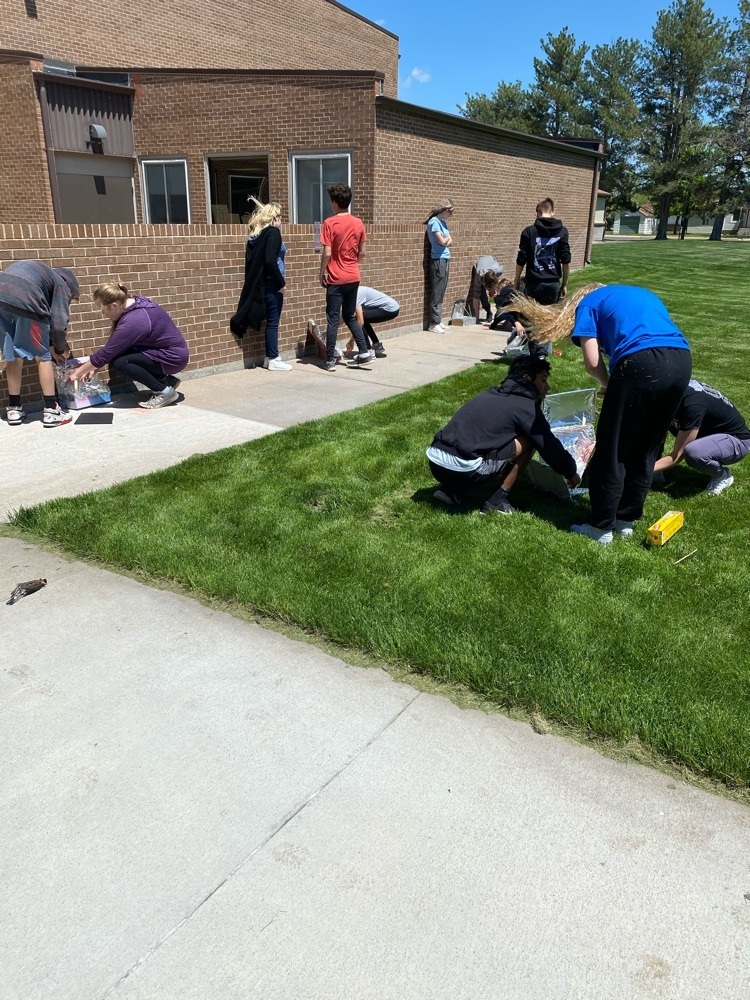 8th grade building solar collectors.