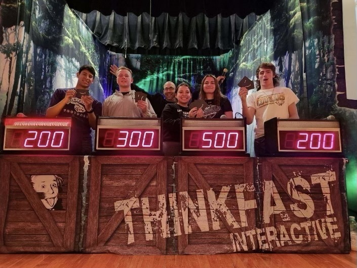 ThinkFast Interactive employs active and experiential learning that provides participants with memory hooks to promote retention and retrieval. The exclusive content concept moves between memory hook questions that relate to popular culture and awareness content questions to maintain participant attention. The number one way to trigger memory recall is by emotional association. The program provides a “clue” or stimulus that triggers an emotion, then partners these emotions with factual information. The assembly program employs multiple forms of visual games to involve limbic functioning as well as visual memory. This type of learning activity is the mental counterpart to memory, and makes learning a fun, enthusiastic, and challenging experience. While students may not remember every single fact presented, the overall effect is that a positive emotional feeling is associated with knowing critical safety information, and attitudes are shifted towards valuing personal safety and promoting the safety of others.  Students of Julesburg High School participate in the ThinkFast Interactive Game Show to display their knowledge as the final round of the assembly.  Students won Amazon gift cards for their participation.  The overall winners, Savanna Harris & Jeidy Villalobos split a $100 gift card!!