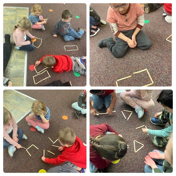 students building shapes with popsicle sticks