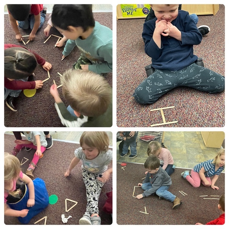 students building shapes with popsicle sticks